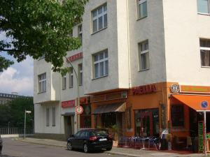 a car parked in front of a building at Hotel Messe am Funkturm in Berlin