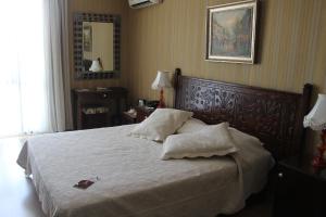 Bella View Art Boutique Hotel客房内的一张或多张床位