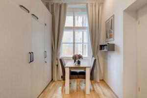 TV a/nebo společenská místnost v ubytování Maison Residence Prague