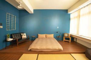 漫半拍 Lento Hostel 客房内的一张或多张床位