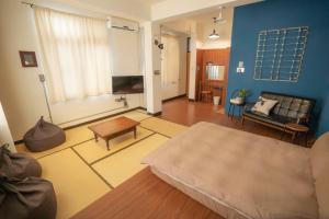 漫半拍 Lento Hostel 的电视和/或娱乐中心