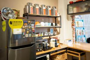 漫半拍 Lento Hostel 的厨房或小厨房