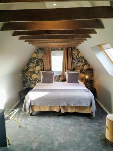 Postel nebo postele na pokoji v ubytování Hotel Lepelbed