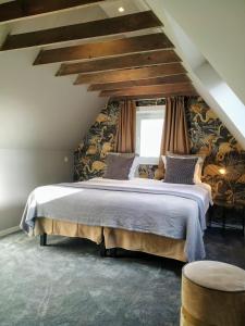 Postel nebo postele na pokoji v ubytování Hotel Lepelbed