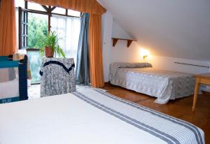Postel nebo postele na pokoji v ubytování Casa La Tablía, un chalet familiar para disfrutar de Cantabria