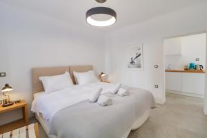 Posteľ alebo postele v izbe v ubytovaní Athens Residence Apartments