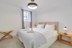 Posteľ alebo postele v izbe v ubytovaní Athens Residence Apartments