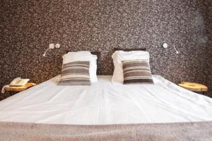 Postel nebo postele na pokoji v ubytování Hotel Lepelbed