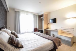 Postel nebo postele na pokoji v ubytování Hotel Lepelbed