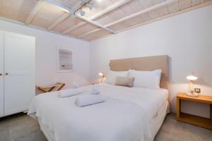 Posteľ alebo postele v izbe v ubytovaní Athens Residence Apartments