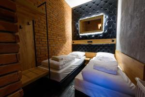 Posteľ alebo postele v izbe v ubytovaní Lord Jack Apartments