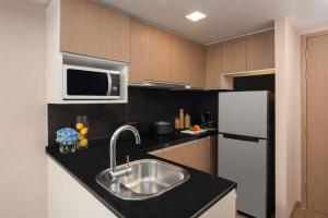 Η κουζίνα ή μικρή κουζίνα στο Citadines Sukhumvit 8 Bangkok