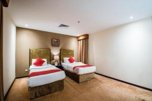Cama o camas de una habitación en Eastward Hotel