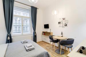 TV a/nebo společenská místnost v ubytování Maison Residence Prague