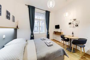 Postel nebo postele na pokoji v ubytování Maison Residence Prague
