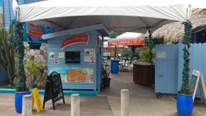 a hot dog stand in front of a restaurant at SandCastles Holiday #C9 in Ocho Rios