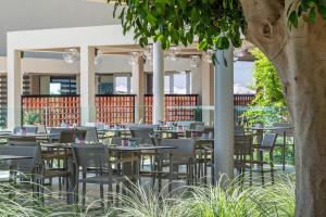 Reštaurácia alebo iné gastronomické zariadenie v ubytovaní Amada Colossos Resort
