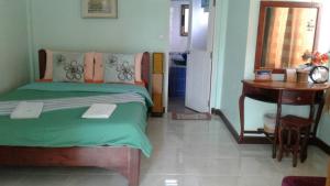 Postel nebo postele na pokoji v ubytování Montra Resort
