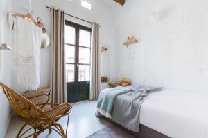 Katil atau katil-katil dalam bilik di En Ville Boutique Apartments Sant Antoni