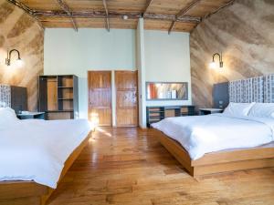 A bed or beds in a room at Collection O Casona De Minas