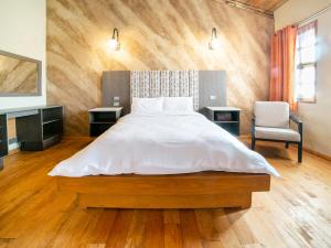 A bed or beds in a room at Collection O Casona De Minas