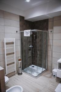Koupelna v ubytování Hotel Bacchus + 16 fotografií