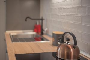 Køkken eller tekøkken på Realkasa Old Town Flat