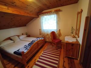 Postel nebo postele na pokoji v ubytování Apartmani Milić