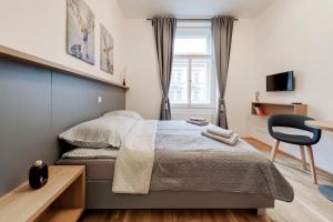 Postel nebo postele na pokoji v ubytování Maison Residence Prague