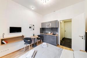 Kuchyň nebo kuchyňský kout v ubytování Maison Residence Prague