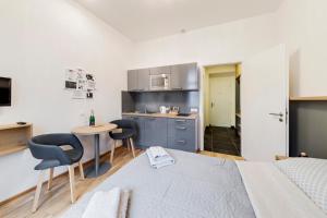 Postel nebo postele na pokoji v ubytování Maison Residence Prague