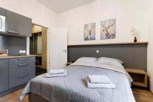 Postel nebo postele na pokoji v ubytování Maison Residence Prague