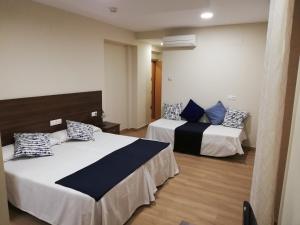 
Cama o camas de una habitación en Hosteria de Rafi
