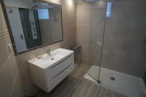 Ванная комната в Vila Gaivota 3G