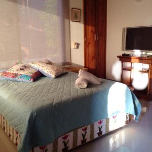 Ein Bett oder Betten in einem Zimmer der Unterkunft CABAÑA LA CLARA
