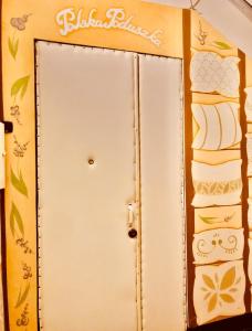 a door with a sign that reads kitchen appliances at Polska Poduszka in Lviv