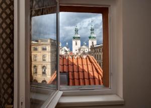 Nespecifikovaný výhled na destinaci Praha nebo výhled na město při pohledu z hotelu