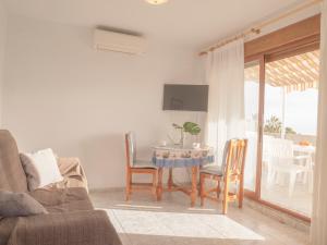 TV a/nebo společenská místnost v ubytování Apartamentos Marineu Jazmines