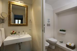 Kúpeľňa v ubytovaní Le Suites Del Duomo House
