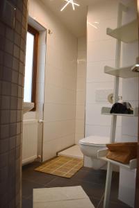 Ein Badezimmer in der Unterkunft Querfeldheim Fewo "Gelb"
