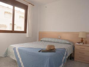 Postel nebo postele na pokoji v ubytování Apartamentos Marineu Jazmines