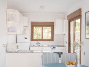 Kuchyň nebo kuchyňský kout v ubytování Apartamentos Marineu Jazmines