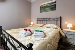 Tempat tidur dalam kamar di Appartamento Eden Tuscany