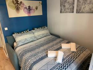 En eller flere senge i et værelse på Azur Studios Cannes