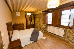 Postel nebo postele na pokoji v ubytování Apartamentos Casa Mateo