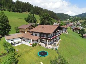an aerial view of a house with a frisbee at Pension Anni in Wagrain