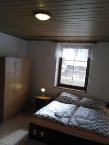 Letto o letti in una camera di Apartmá Doubek