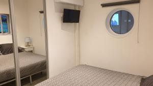 Ένα ή περισσότερα κρεβάτια σε δωμάτιο στο Villa les Agapanthes avec piscine et SPA chauffée dans votre appartement +34 φωτογραφίες