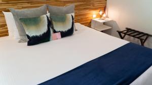 Uma cama ou camas num quarto em Hotel Nya
