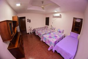 Katil atau katil-katil dalam bilik di Palmera Hotel CDE